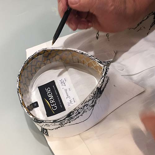 Artist Gregor-T. Kozik signs the original GERMENS shirt DREAMER