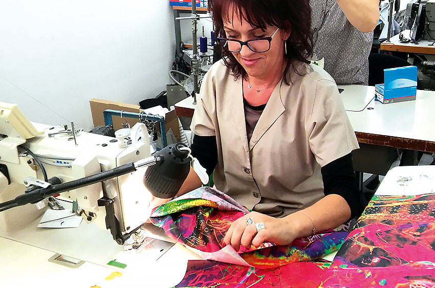 Experienced seamstresses join the fabric pieces together