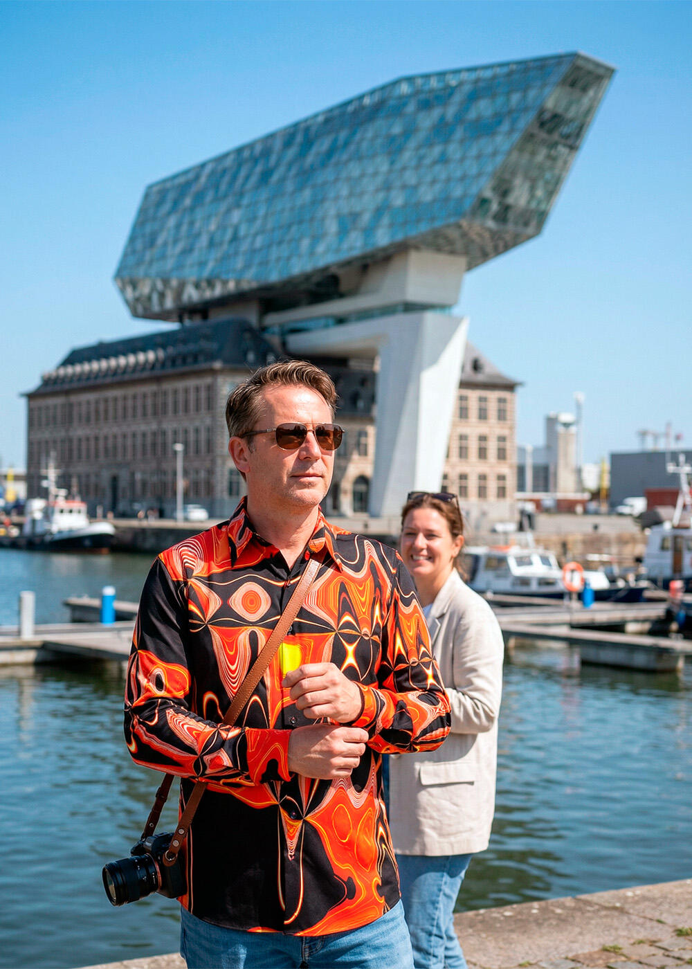 A man wearing a red GERMENS NEW YORK FUNKY shirt out and about in the Belgian city of Antwerp.