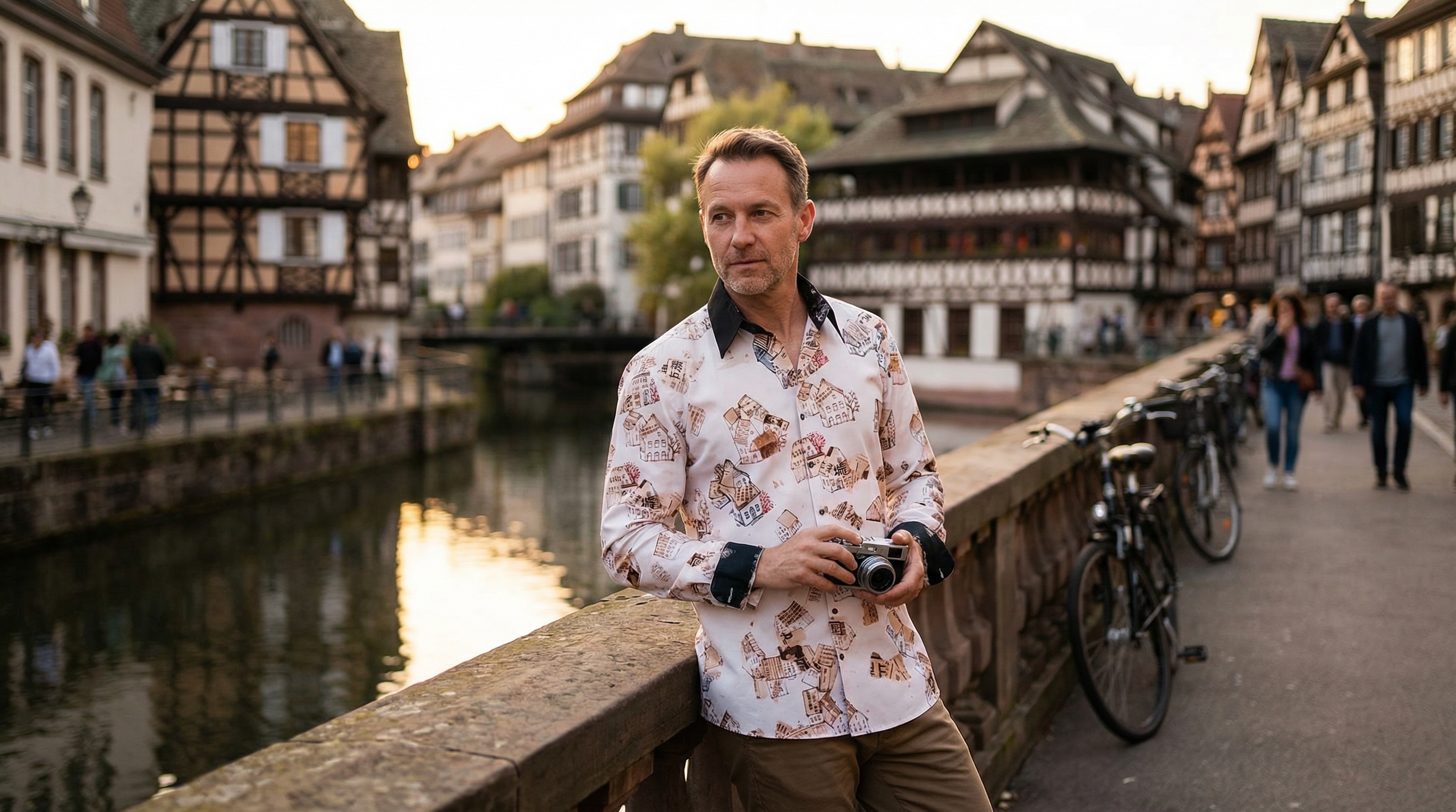 A man wears the brown HOUSES shirt by GERMENS artfashion and is out and about in the French city of Strasbourg.